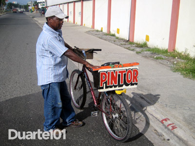 Pintor en bicicleta